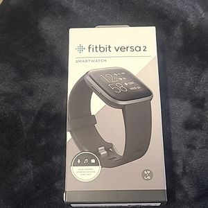 Brand New Unopened Fibit Versa 2 two bands